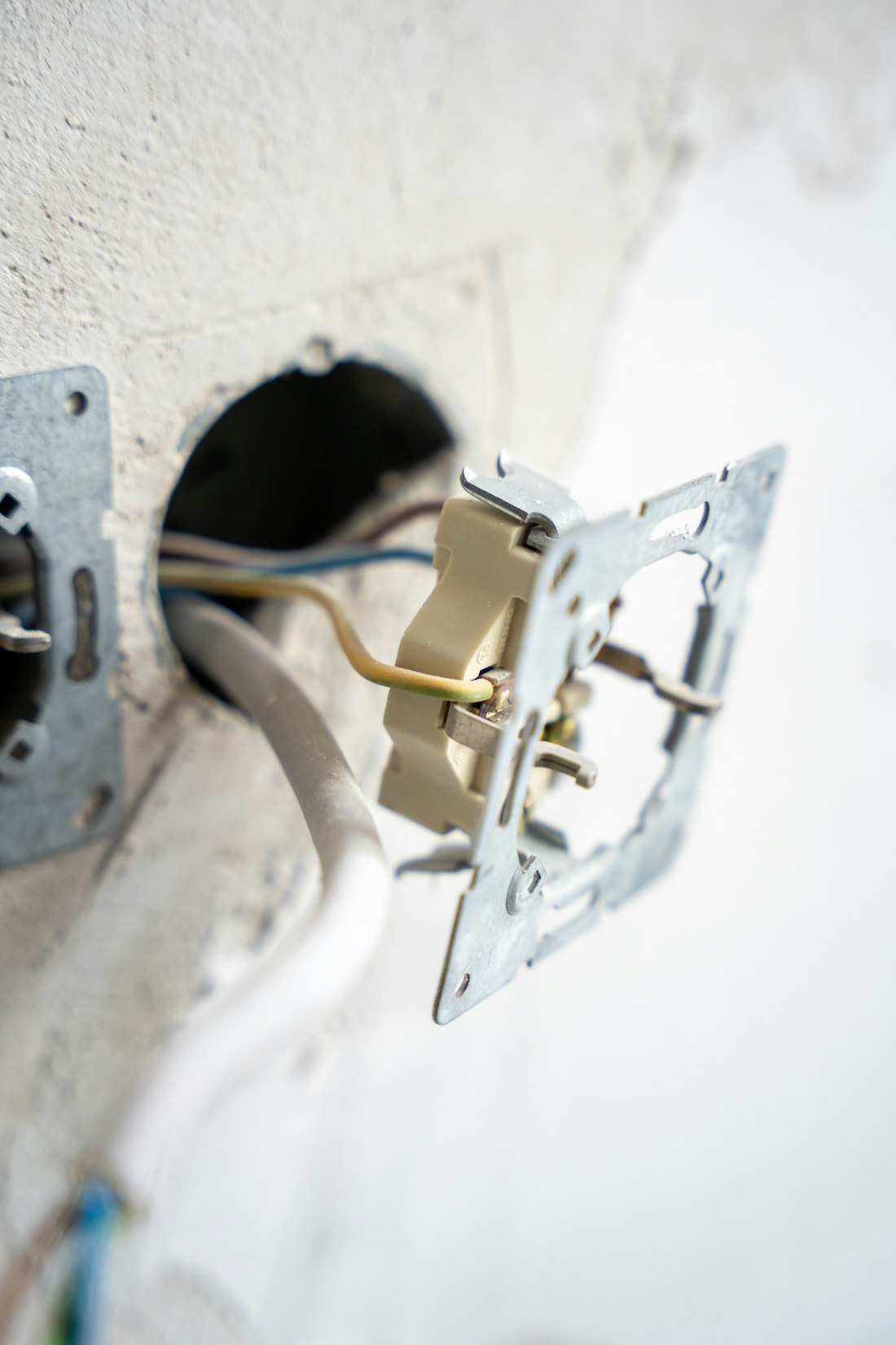 Electrical wiring pulled through a wall before finish work